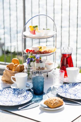 a table with a tray of food on a table at VistaLago Torbole in Nago-Torbole