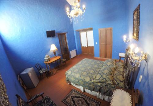 Postel nebo postele na pokoji v ubytování Hotel Monasterio