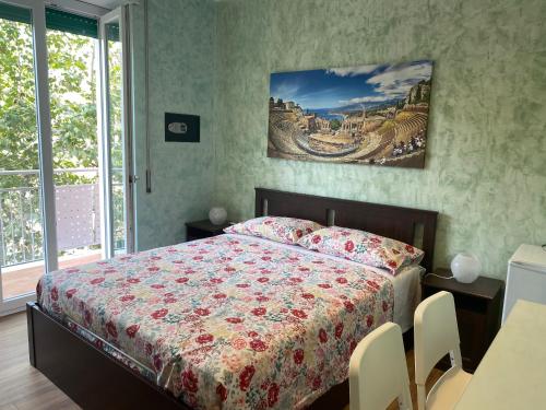 Giường trong phòng chung tại B&B CATANIA CENTRO - Charme & More