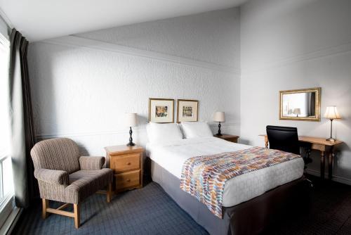 Hôtel Chéribourgにあるベッド