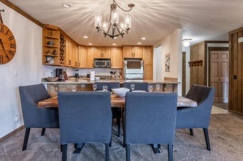 a kitchen with a dining room table and chairs at Mountainback 15 in Old Mammoth