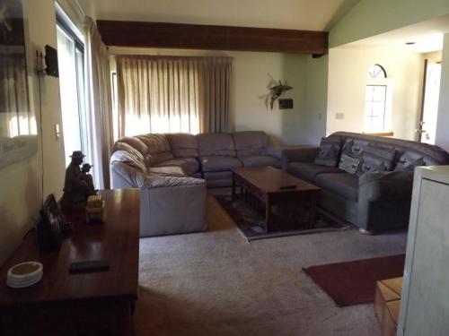 a living room with a couch and a table at Rr-edgewater01 in June Lake