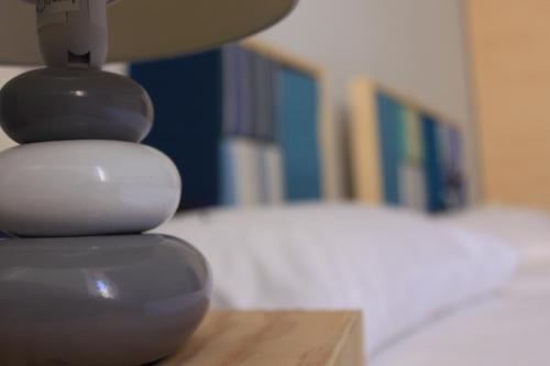 a stack of rocks sitting on top of a table at Giljana ensuite rooms shared terrace & kitchen in St Julian's