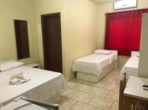 Katil atau katil-katil dalam bilik di Hotel Dom Alcides