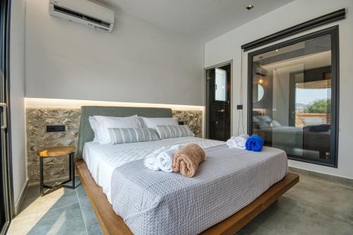 Katil atau katil-katil dalam bilik di Terra Secreta Luxury Villas