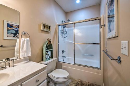 a bathroom with a shower and a toilet and a sink at Luxe Lake Cumberland Retreat with Decks on 1 Acre! in Jamestown