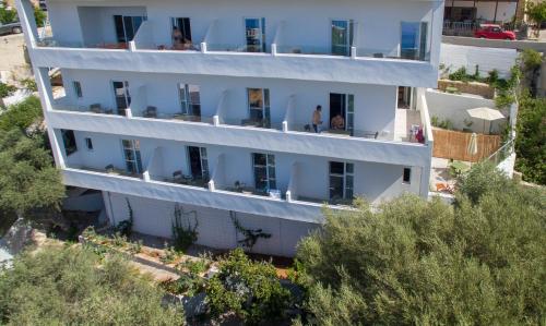 an aerial view of a white apartment building at Eleana Nature & Art in Khóra Sfakíon