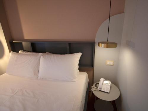 Postel nebo postele na pokoji v ubytování Demo Hotel Design Emotion