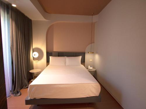 Postel nebo postele na pokoji v ubytování Demo Hotel Design Emotion