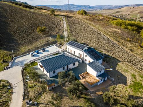 an aerial view of a house with solar panels on its roof at Casa Dolce Casa - Casa Vacanze in Ariano Irpino