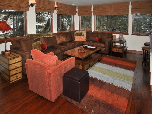 a living room with a couch and a table at Lionshead Center #201 Condo in Vail