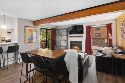 a living room with a couch and a table at Breakaway West #212 condo in Vail