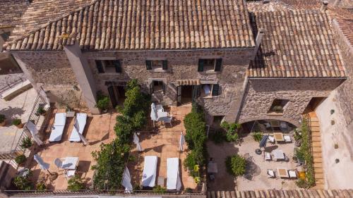 an aerial view of a building with a roof at Es Nord in Estellencs