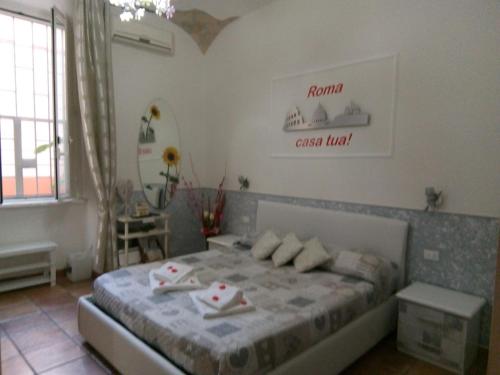 Cama o camas de una habitación en Little House Roma