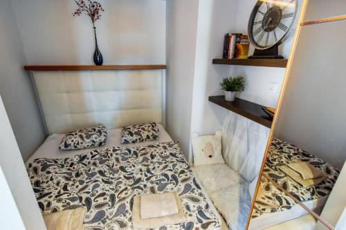 Ένα ή περισσότερα κρεβάτια σε δωμάτιο στο Danube Pearl Boutique Apartment