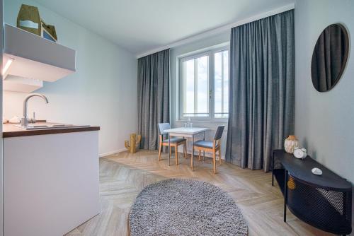 Posezení v ubytování Vienna House Easy by Wyndham Augsburg