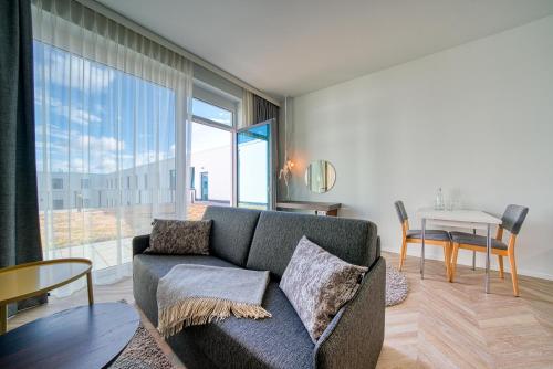 Posezení v ubytování Vienna House Easy by Wyndham Augsburg