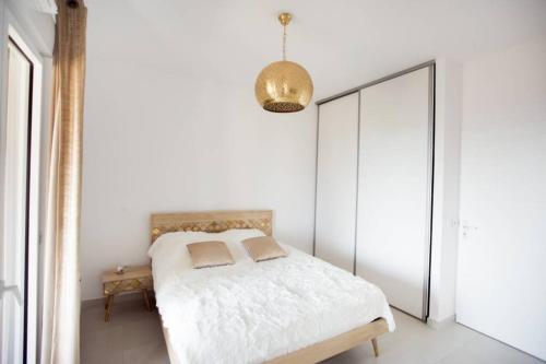 Posteľ alebo postele v izbe v ubytovaní Magnifique appartement avec vue imprenable