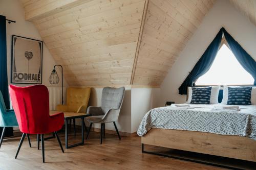 Posteľ alebo postele v izbe v ubytovaní Osada Witów - apartament „Czerwone Wierchy”