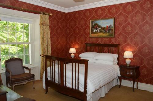 Katil atau katil-katil dalam bilik di Cannaway House B&B