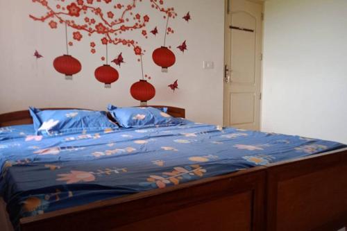 Postel nebo postele na pokoji v ubytování Sea Breeze Homestay with pool