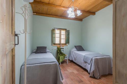 Postel nebo postele na pokoji v ubytování Casa Magica
