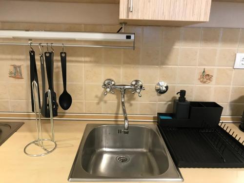 Kuchyň nebo kuchyňský kout v ubytování YelaYeti Apartments
