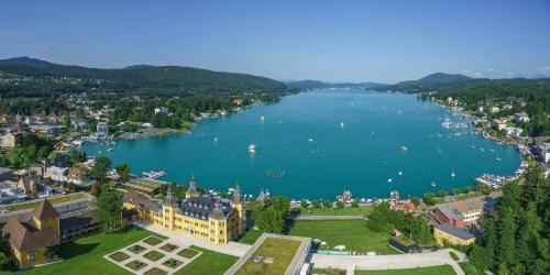 an aerial view of a large body of water at Hotel Villa Flora in Velden am Wörthersee
