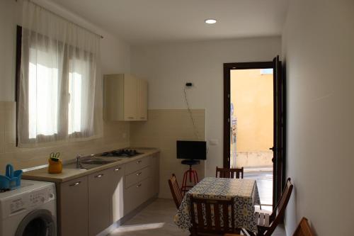Kuchyň nebo kuchyňský kout v ubytování casa sandrina piano terra
