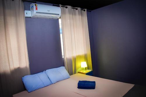Reef Hostel & Pousadaにあるベッド