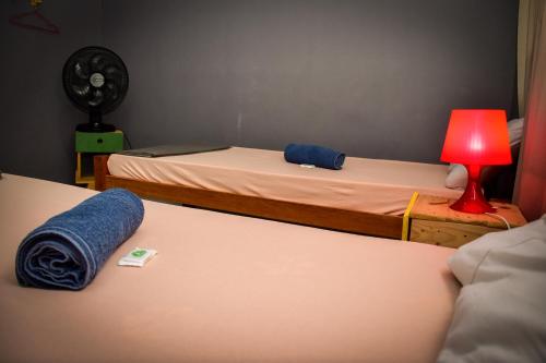 Reef Hostel & Pousadaにあるベッド
