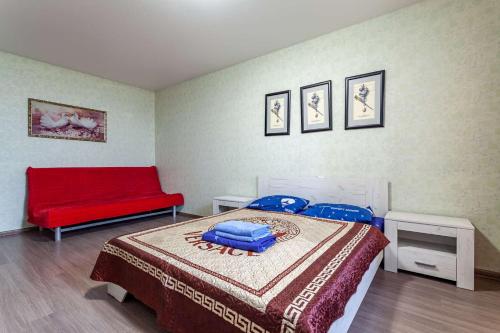  Кровать или кровати в номере Standard Brusnika Apartments Maryina Roshcha 