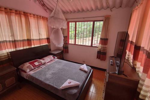 Postel nebo postele na pokoji v ubytování Hermosa Casa Campestre - Reserva Mínimo 4 Huéspedes