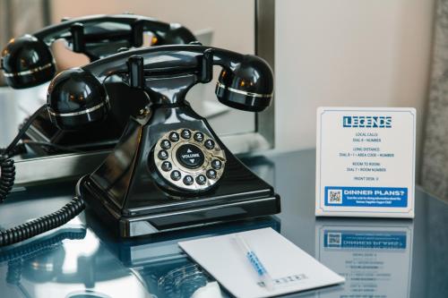 a telephone sitting on top of a table at Hotel Legends in Biloxi