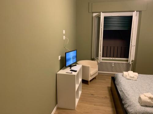 Ein Bett oder Betten in einem Zimmer der Unterkunft B&B Fossatello affittacamere