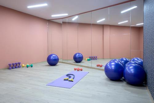 
a room filled with lots of different colored balls at Dolce Athens Attica Riviera in Vravrona
