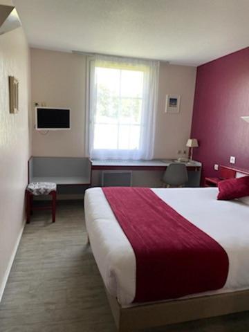 Μια τηλεόραση ή/και κέντρο ψυχαγωγίας στο Hotel Saint Odilon
