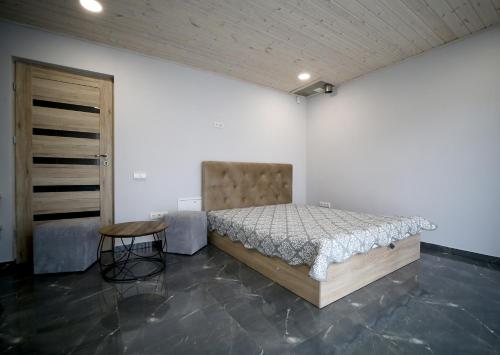 Ein Bett oder Betten in einem Zimmer der Unterkunft Kėdainiai Old town apartment