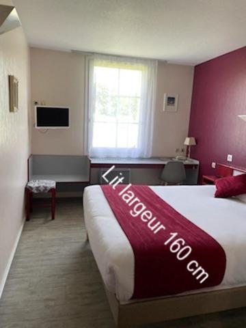 Μια τηλεόραση ή/και κέντρο ψυχαγωγίας στο Hotel Saint Odilon