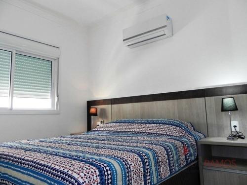 Cama o camas de una habitación en 1058 - Praia de Bombinhas locação de temporada