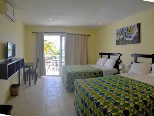 Postel nebo postele na pokoji v ubytování Costarena Beach Hotel