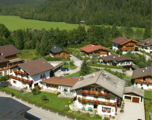 an aerial view of a large house with at Haus Alpenblick in Pertisau