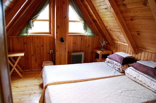Кровать или кровати в номере Rehe Turismitalu