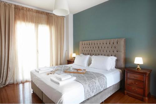 Posteľ alebo postele v izbe v ubytovaní Volos View