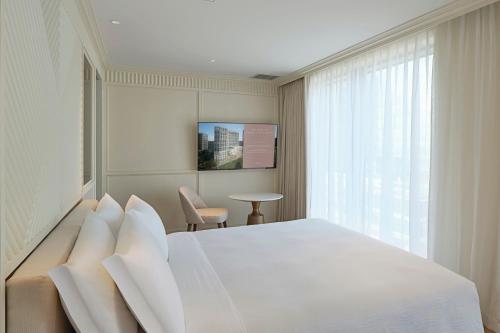 Grand Josun Busanにあるテレビまたはエンターテインメントセンター