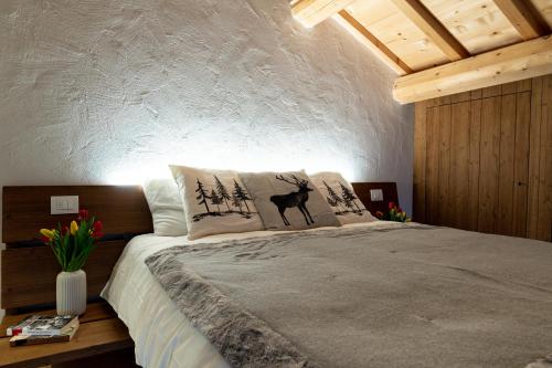 Ein Bett oder Betten in einem Zimmer der Unterkunft Antico Borgo Brunelli
