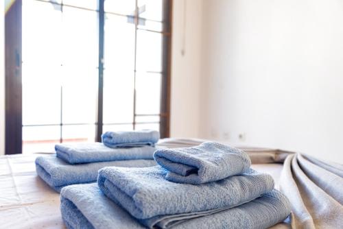 a group of towels sitting on the floor in a room at Villa Simba in Corralejo