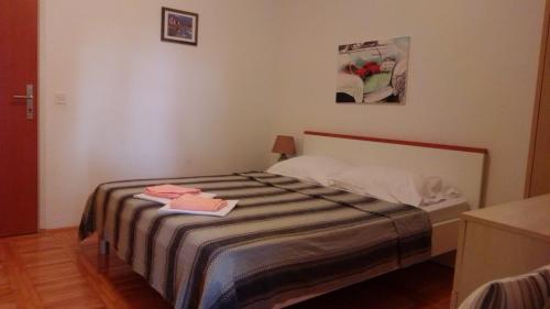 Posteľ alebo postele v izbe v ubytovaní Apartmani Crkvina