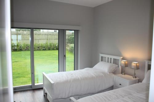 Postel nebo postele na pokoji v ubytování Sea Vista - Rathmullan