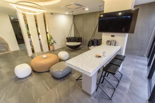 Μια τηλεόραση ή/και κέντρο ψυχαγωγίας στο SR Grand Hotel Chiangmai
